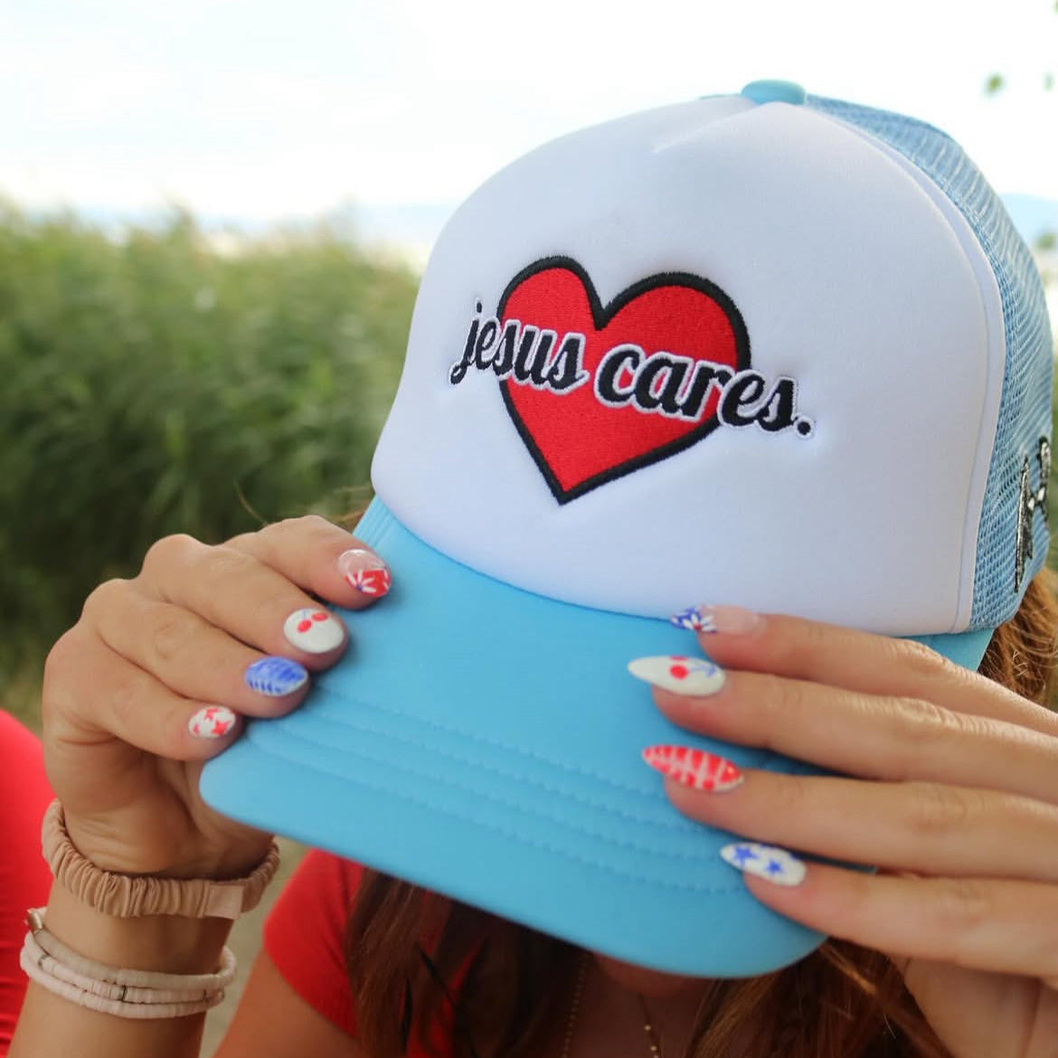 (Blue) Jesus Cares Trucker Hat