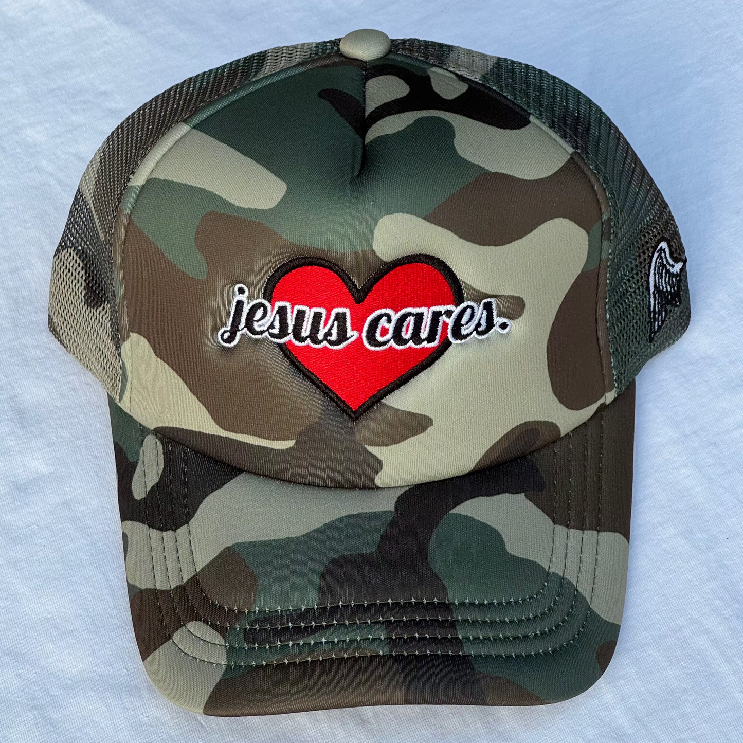 (Camo) Jesus Cares Trucker Hat