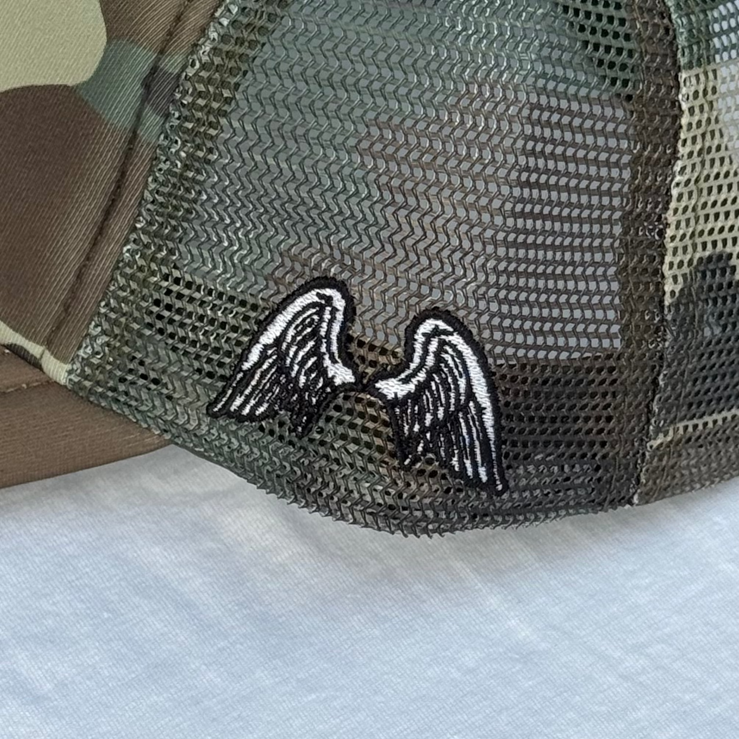 (Camo) Jesus Cares Trucker Hat