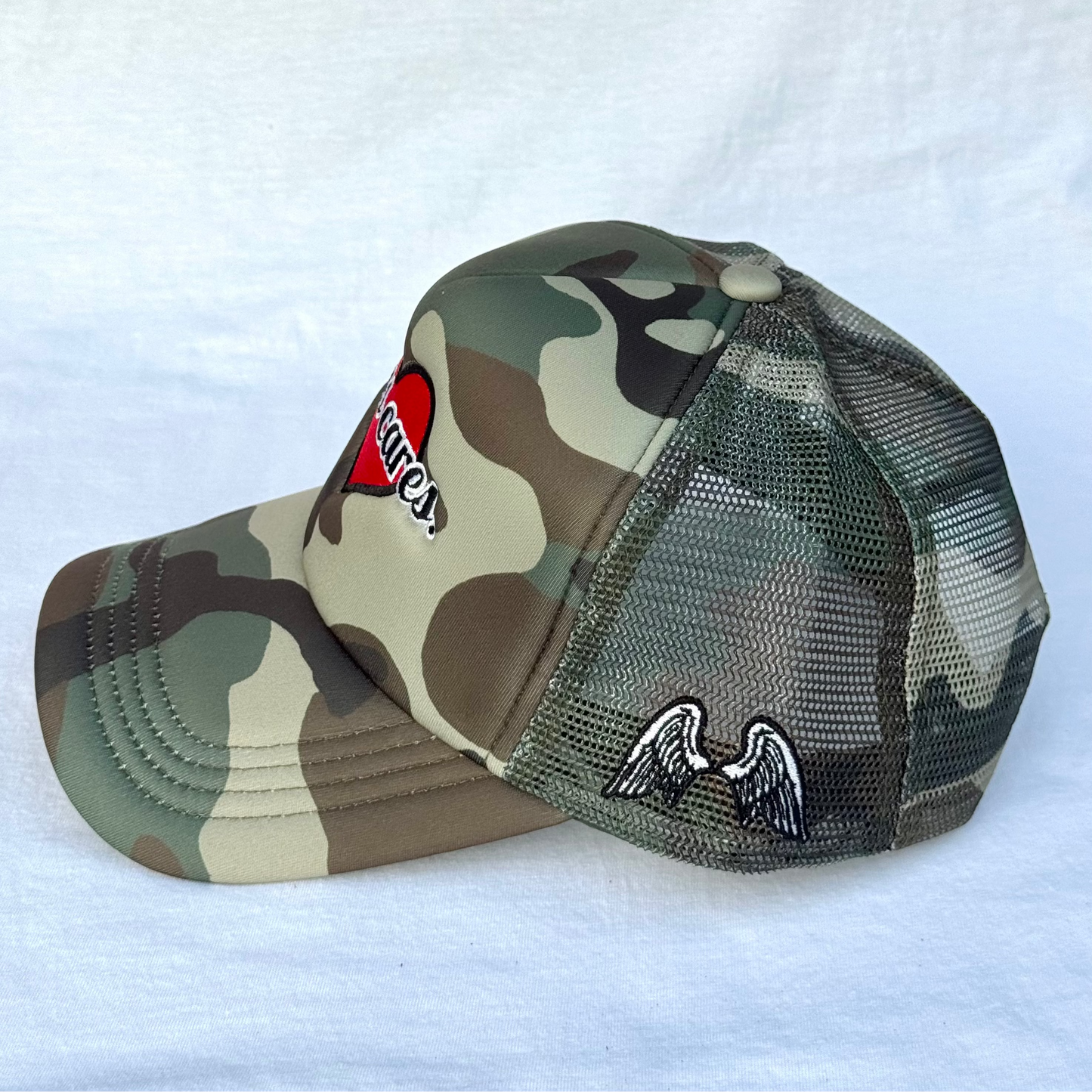 (Camo) Jesus Cares Trucker Hat