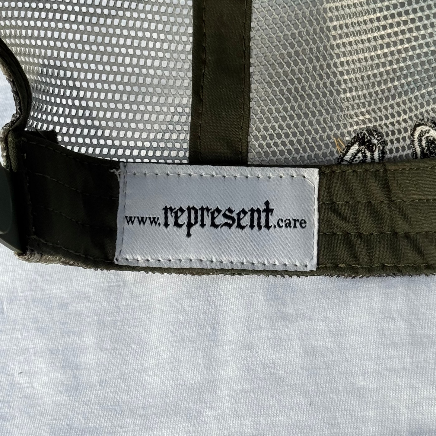 (Camo) Jesus Cares Trucker Hat