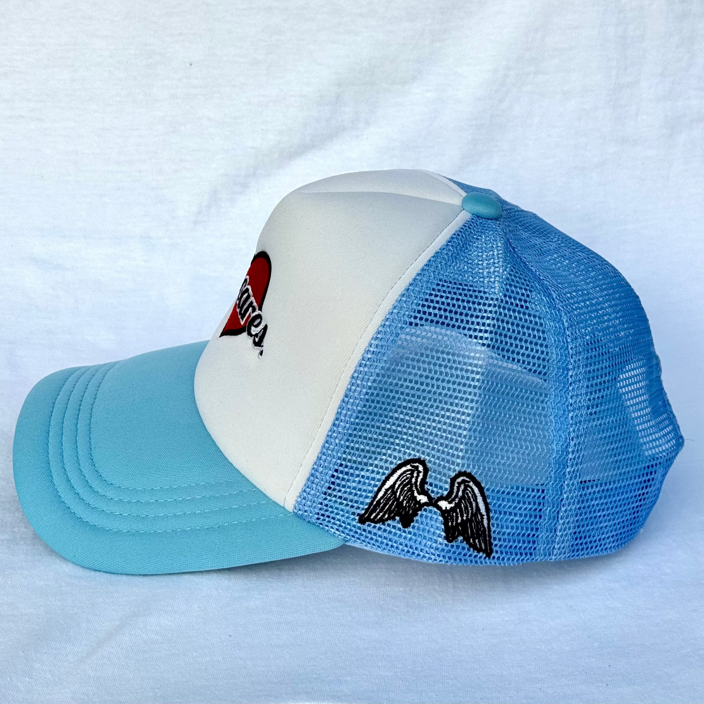 (Blue) Jesus Cares Trucker Hat
